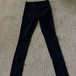 selling black lululemon leggings with flare bottoms